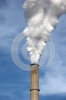 Smoke coming out a chimney