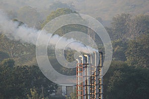 Smoke coming out of high chimney