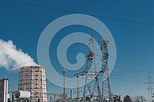 Smoke cooling tower pollution of the surrounding air environment of the atmosphere from the industrial plant and power lines high