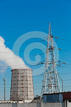 Smoke cooling tower pollution of the surrounding air environment of the atmosphere from the industrial plant and power lines high