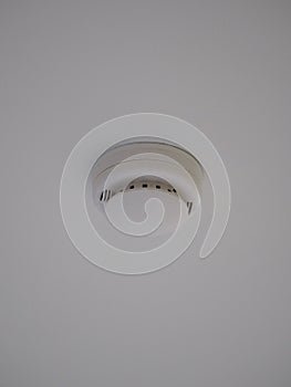 Smoke detector on white celling