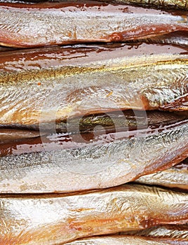 Smoke-dried fish close up.