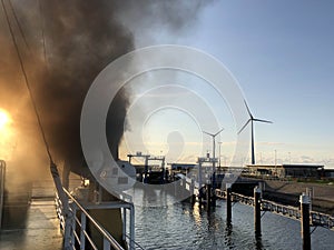 Smoke from a ferry in the Eemshaven