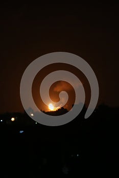 Smoke and flames rise after war planes belonging to the Israeli army carried out airstrikes over Gaza City