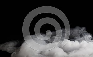 Smoke fragments on a black background photo