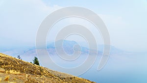 Smoke hanging over Kamloops Lake in central British Columbia