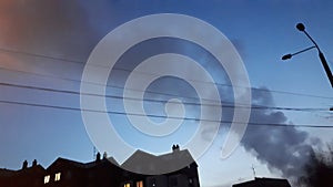 Smoke on a twilit sky