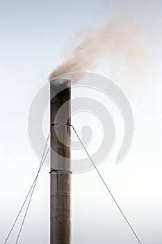 Smoke release from the steel smokestack