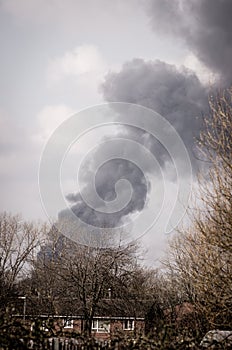 Smoke rising into the sky, Manchester England.