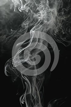 Smoke Rising Up Into the Air on a Black Background