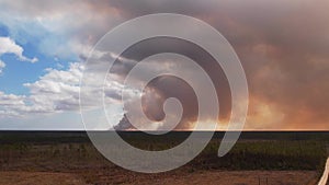 Smoke rolling from huge acreage wild land fire in Florida panhandle