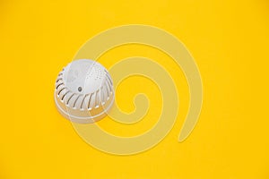 The smoke sensor on the ceiling