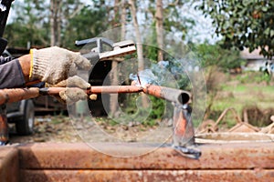 Smoke and sparks from welding steel