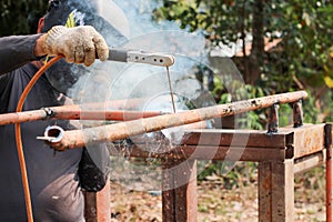 Smoke and sparks from welding steel