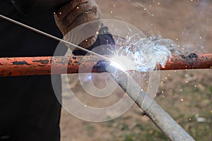 Smoke and sparks from welding steel