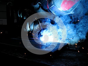 Smoke and sparks in welding zone