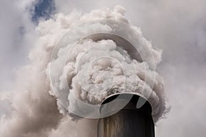 Smoke stack billowing pollution photo