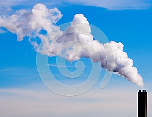 Smoke stack and blue sky