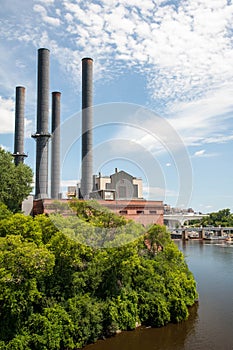 Smoke stacks on the river