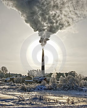 Smoke of thermal station. Winter Sun