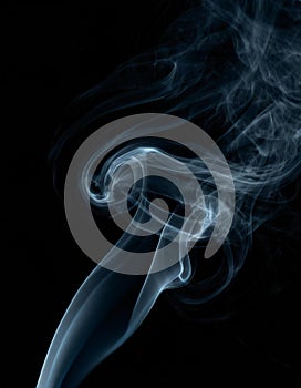 Smoke in wavy flow on black background