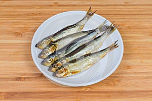 Smoked baltic herring on the saucer