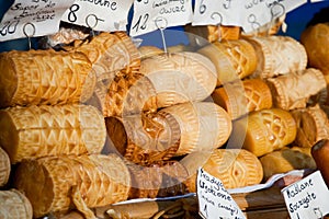 Smoked cheese Oscypki on the market in Zakopane