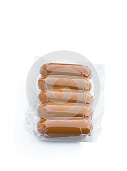 Smoked cheese sticks in vacuum pack isolated on white