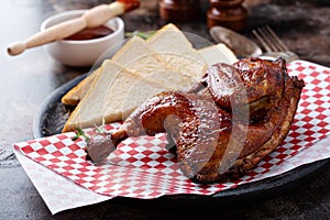 Smoked chicken half with toast photo