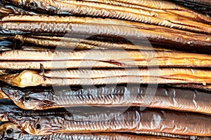 Smoked eels freshly prepared and ready to eat.