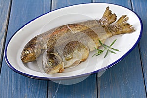 Smoked fish on dish