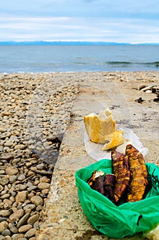 Smoked fish Omul and loaf of bread