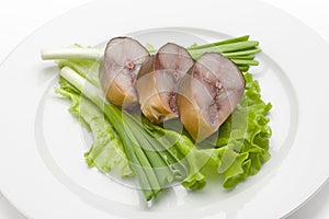 Smoked fish pieces with onion