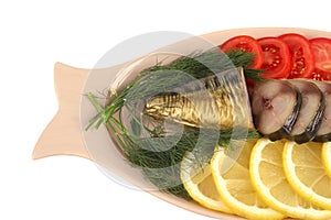 Smoked fish served with vegetables