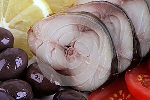 Smoked fish served with vegetables