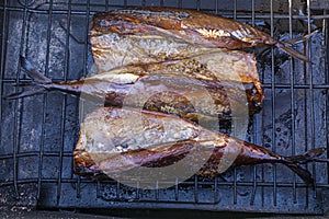 Smoked mackerel on the grill. View from above. Natural eco-friendly food concept