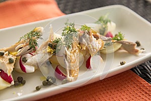 Smoked Mackerel with jersey royals, radishes, capers & dill