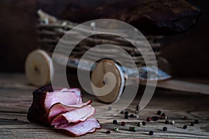 Smoked meat on wooden background