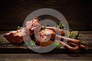 Smoked meats and sausages. A set of traditional smoked meats and sausages: ham,gammon, pork loin, home-style sausages, kabanosy. photo