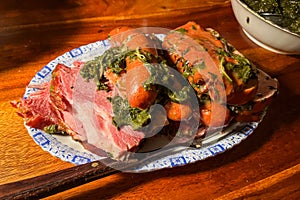 Smoked Pork Chops and Sausages with Kale (Kasseler mit Grunkohl) a Hearty Northern German Dish