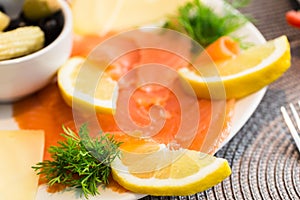 Smoked salmon appetizer with lemon