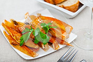 Smoked salmon bellies with greens