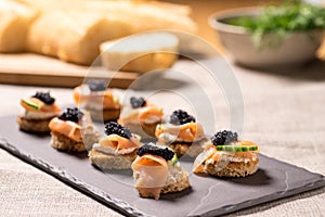 Smoked Salmon Canapes with Sour Cream and Caviar