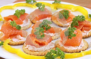 Smoked salmon and cream cheese on crackers