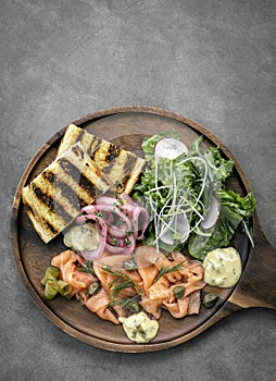 Smoked salmon gourmet scandinavian food appetizer platter in sweden restaurant