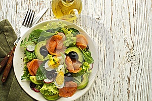 Smoked salmon salad with lettuce and egg