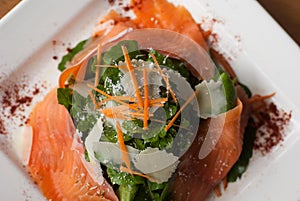 Smoked salmon salad with rocket