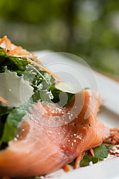 Smoked salmon salad with rocket