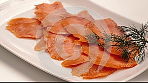 Smoked salmon slices.