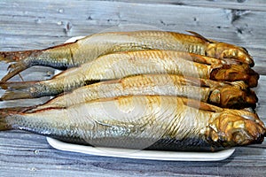 Smoked salty Herring forage fishes, salt-cured and smoked, also known as silver darlings, harvested for their flesh and eggs, and